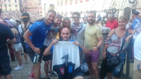 One of the Brits had bought the flag of the winning contrada